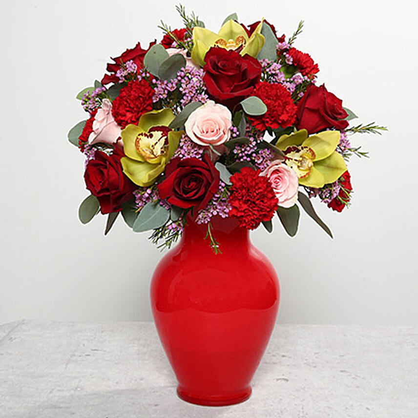 Mixed Flowers In Red Glass Vase In Uae Gift Mixed Flowers