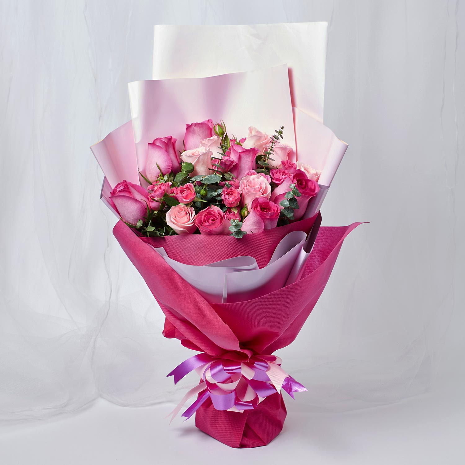 Online Attractive Mixed Roses Wrapped Bouquet Gift Delivery in ...